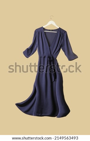 Studio shot of floating blue wrap dress Royalty-Free Stock Photo #2149563493