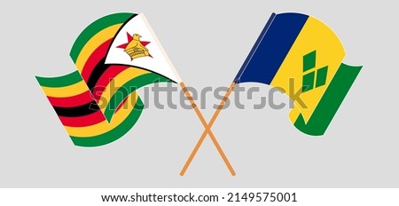 Crossed and waving flags of Zimbabwe and Saint Vincent and the Grenadines. Vector illustration