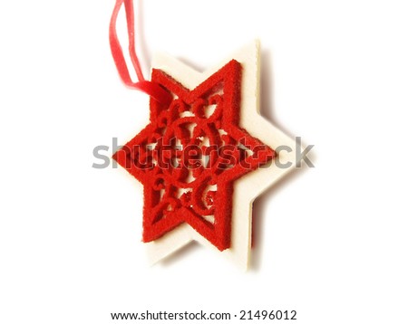Closeup photo of a nice hanging handmade red  Christmas decoration star. Isolated on white.