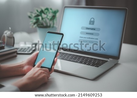 Woman hand enter a one time password for the validation process, Mobile OTP secure Verification Method, 2-Step authentication web page. Royalty-Free Stock Photo #2149609253
