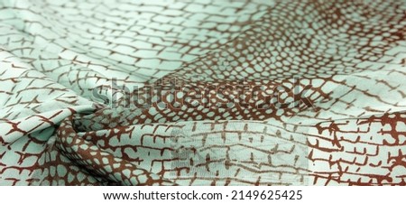 python skin silk fabric, brown pattern, african theme, fulvous, lurid, grayish-brown. Texture. Background.