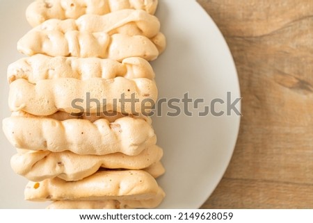 almonds meringue stick on plate - French snack dessert style