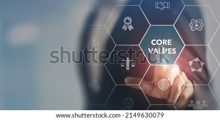 Core values,corporate values concept.  Company culture and strategy related to business and customer relationships, growth. Principles guide company's action. Businessman touching on core values. Royalty-Free Stock Photo #2149630079