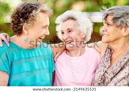 Theyre like sisters. Shot of a group of smiling senior women standing outside. Royalty-Free Stock Photo #2149635531