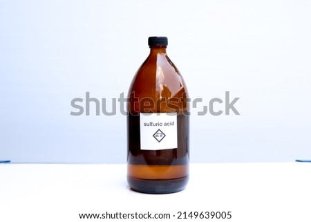 sulfuric acid in bottle, chemical in the laboratory and industry Royalty-Free Stock Photo #2149639005