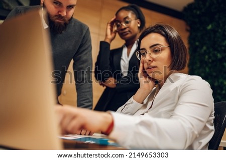 Multiracial business team having a meeting in the office and solving a problem. business, teamwork, people and crisis concept. Royalty-Free Stock Photo #2149653303