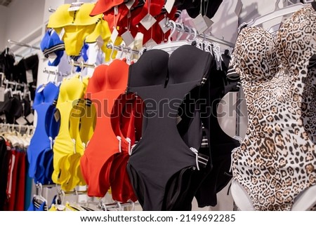 Women's swimsuit in the store. Fashionable swimsuits are continuous. Royalty-Free Stock Photo #2149692285