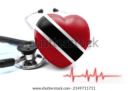 Flag of Trinidad and Tobago in the form of a heart next to a stethoscope, the concept of the world health system