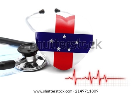 Flag of Netherlands Antilles in the form of a heart next to a stethoscope, the concept of the world health system