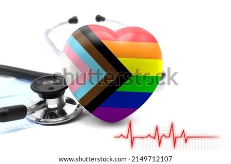 Flag of Inclusive Pride in the form of a heart next to a stethoscope, the concept of the world health system