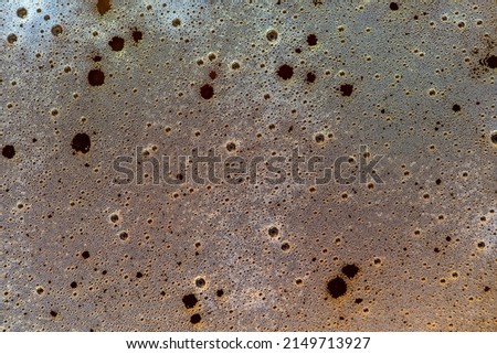 Background of beer foam, top view, close up, macro. Beer foam texture