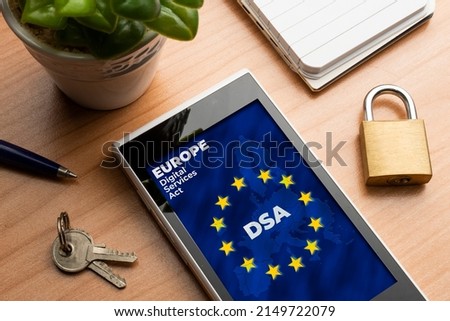 Digital Services Act (DSA) concept. Smartphone with the european map and flag with the text: DSA Digital Services Act Royalty-Free Stock Photo #2149722079