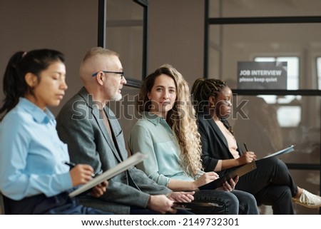 Young girl taking part at job interview