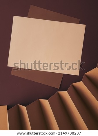 Beige and brown A4 papers as office stationery flatlay, luxury branding flat lay and brand identity design for mockups, work and creativity concept
