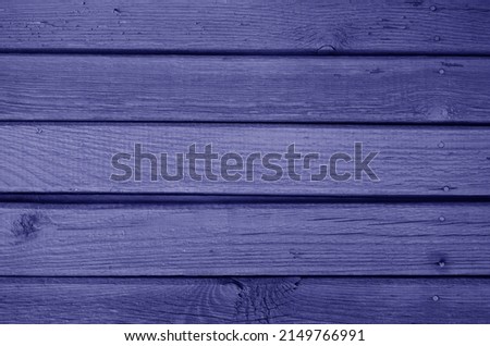 Old grungy wooden planks background in blue color. Abstract background and texture for design.                      