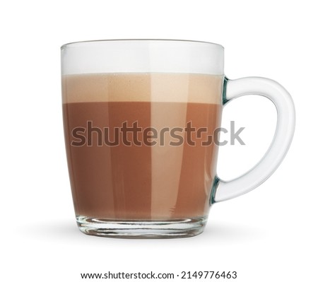 Natural cocoa drink with milk in a glass mug. Isolated on white background