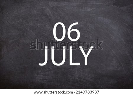 06 July text with blackboard background for calendar. And July is the seventh month of the year