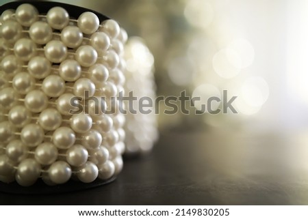 A string of pearls. Artificial garland pearls. Interior design and decoration.