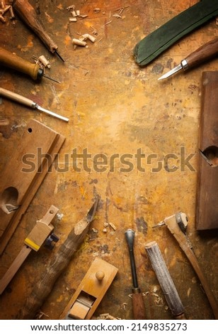 Hand tools Wood (Drill Jig Saw plane chisel) on an old wooden workbench Royalty-Free Stock Photo #2149835273