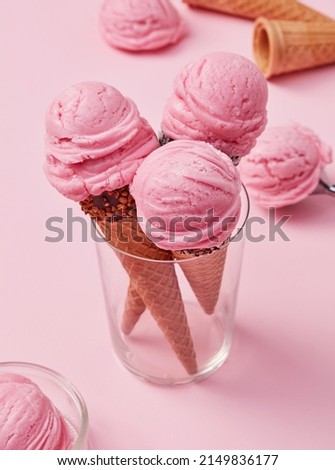 Home made ice cream cones on pink