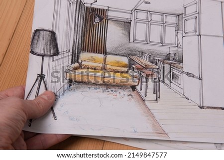 The photo shows sketches, a design project drawn with pencils on a piece of paper. Drawings, sketches, pencils, stationery on the table. Royalty-Free Stock Photo #2149847577