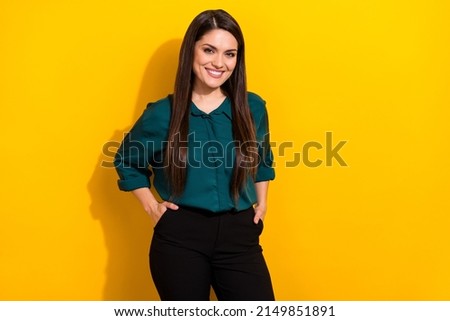 Photo of young cheerful lovely woman hands in pocket intelligent investor economist isolated over yellow color background