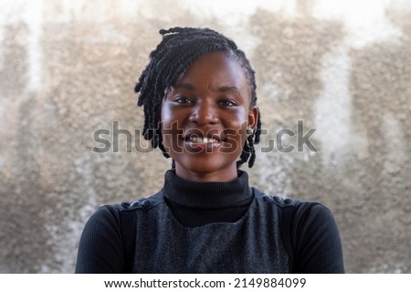 Close up headshot portrait picture of smiling african american businesswoman. Happy attractive confident young diverse woman mentor looking at camera