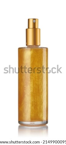 Golden mist in a glass jar, cosmetic for skin toning. Shimmering light for the body. Royalty-Free Stock Photo #2149900095