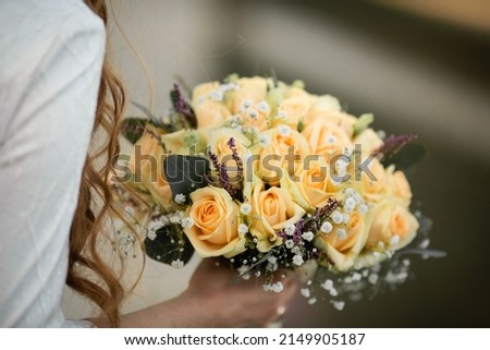 Wedding bouquet with yellow roses.