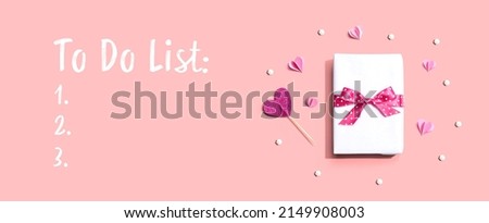 To Do List theme with a gift box and paper hearts