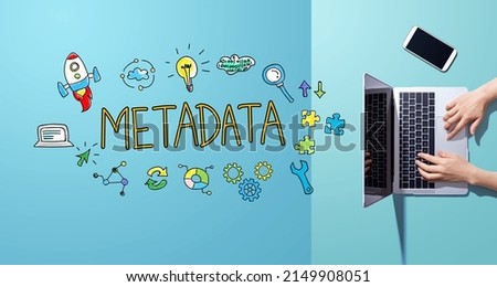 Metadata with person working with a laptop