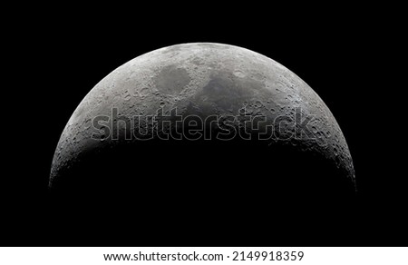 Waxing crescent Moon photographed in color. Many terrain formations are visible, such as craters, highlands, lava-flooded areas of the lunar mare, and traces of blowout material from crater formation. Royalty-Free Stock Photo #2149918359