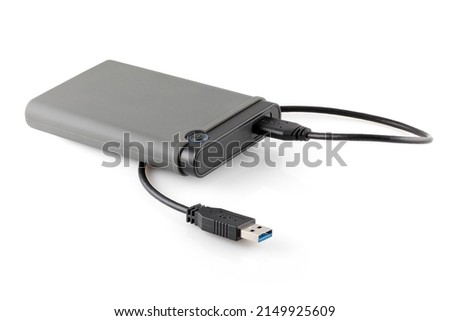 External hard drive disc with usb 3.0 cable, black. Best way of data storage on portable hdd. Close up side left view isolated on white background. Full depth of field. Royalty-Free Stock Photo #2149925609