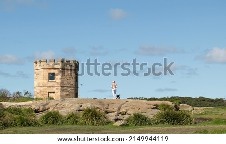 Macquarie Watchtower, La Perouse, Sydney, Australia. Sandstone tower constructed in 1820-22 to  accommodate soldiers stationed to prevent smugglers from entering Botany Bay. In use until 1904. Royalty-Free Stock Photo #2149944119