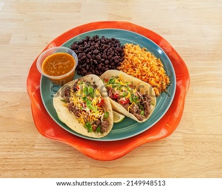 Steak Tacos with Beans and Rice Royalty-Free Stock Photo #2149948513