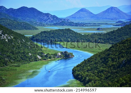 Panorama of a winding river Royalty-Free Stock Photo #214996597