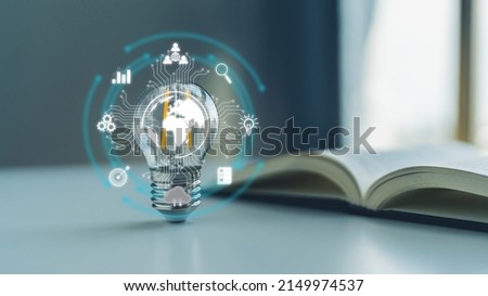 Bright lightbulb or glowing lap with textbook. Business success idea of learning, planning or working. Education concept of studying and knowledge cognition. Businessperson or student training skill Royalty-Free Stock Photo #2149974537