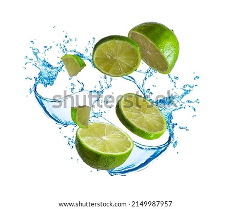flying food concept. juicy lime. splashing water and crushed lime in motion isolated on white. halves of lime. advertising poster.