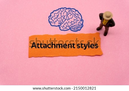 Attachment styles.The word is written on a slip of colored paper. Psychological terms, psychologic words, Spiritual terminology. psychiatric research. Mental Health Buzzwords. Royalty-Free Stock Photo #2150012821