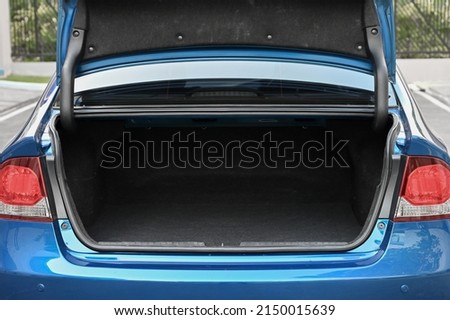 rear view of the car open trunk The exterior of a modern, modern car empty trunk Royalty-Free Stock Photo #2150015639