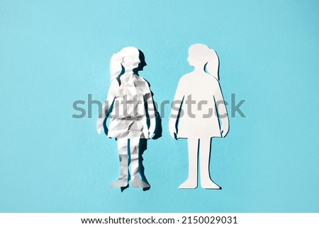Female figures on a blue background. The concept of mental health care.