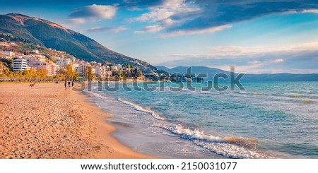 Sunny summer cityscape of Vlore town. Nice morning seascape of Adriatic sea. Splendid outdoor scene of Albania, Europe. Traveling concept background. Royalty-Free Stock Photo #2150031077