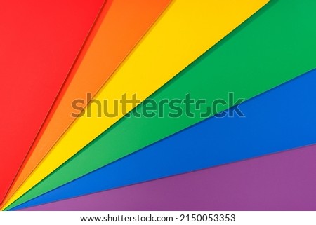 Group of colored cardboard forming a pride flag. LGBT Rainbow flag background
