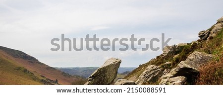 Massive rocks in the mountains. Wide panoramic view of the mountains. Lynmouth, Devon, England, UK