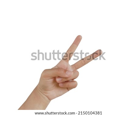 Close up Asian female hand in scissors gesture, number two, victorious gesture, sign finger arm and hand isolated on a white background copy space symbol Royalty-Free Stock Photo #2150104381
