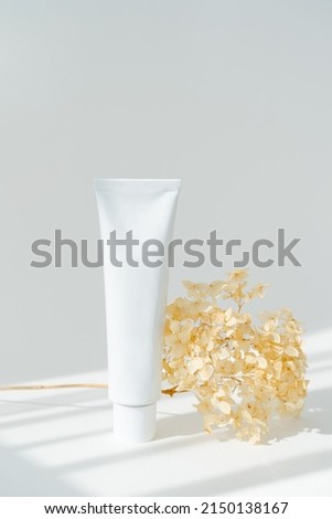 Hand cream white tube vertical mockup, cosmetic and medicine mockup, minimalist design, packaging mockup