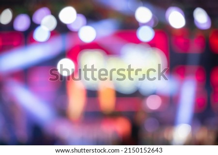 Beautiful blurred images of stage performances at night with lights from a variety of beautiful spotlights.
