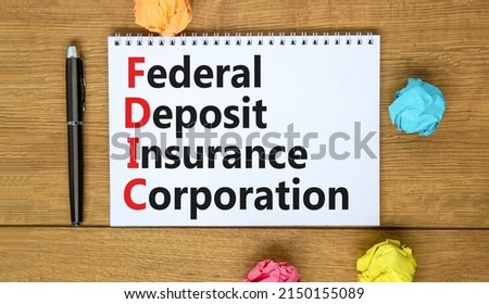 FDIC federal deposit insurance corporation symbol. Concept words FDIC federal deposit insurance corporation on note on white background. Business FDIC federal deposit insurance corporation concept.