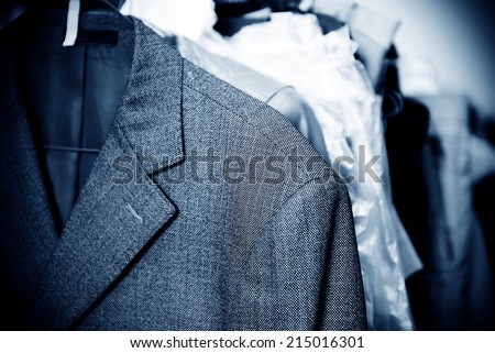 Laundry, hanging on the racks of old clothes. Royalty-Free Stock Photo #215016301