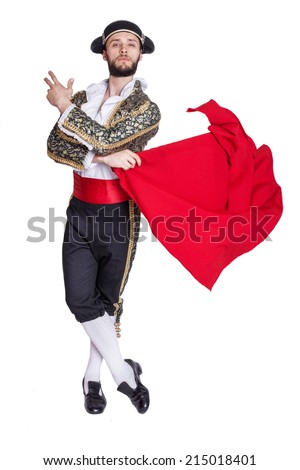 Male dressed as matador on a white background. Studio portrait  Royalty-Free Stock Photo #215018401